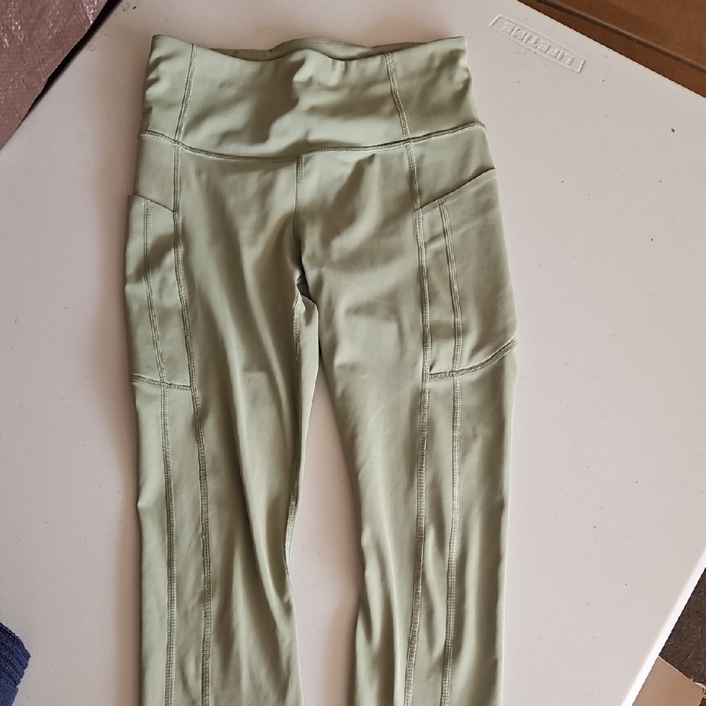 Athleta Ultimate Stash II 7/8 Tight in Tan